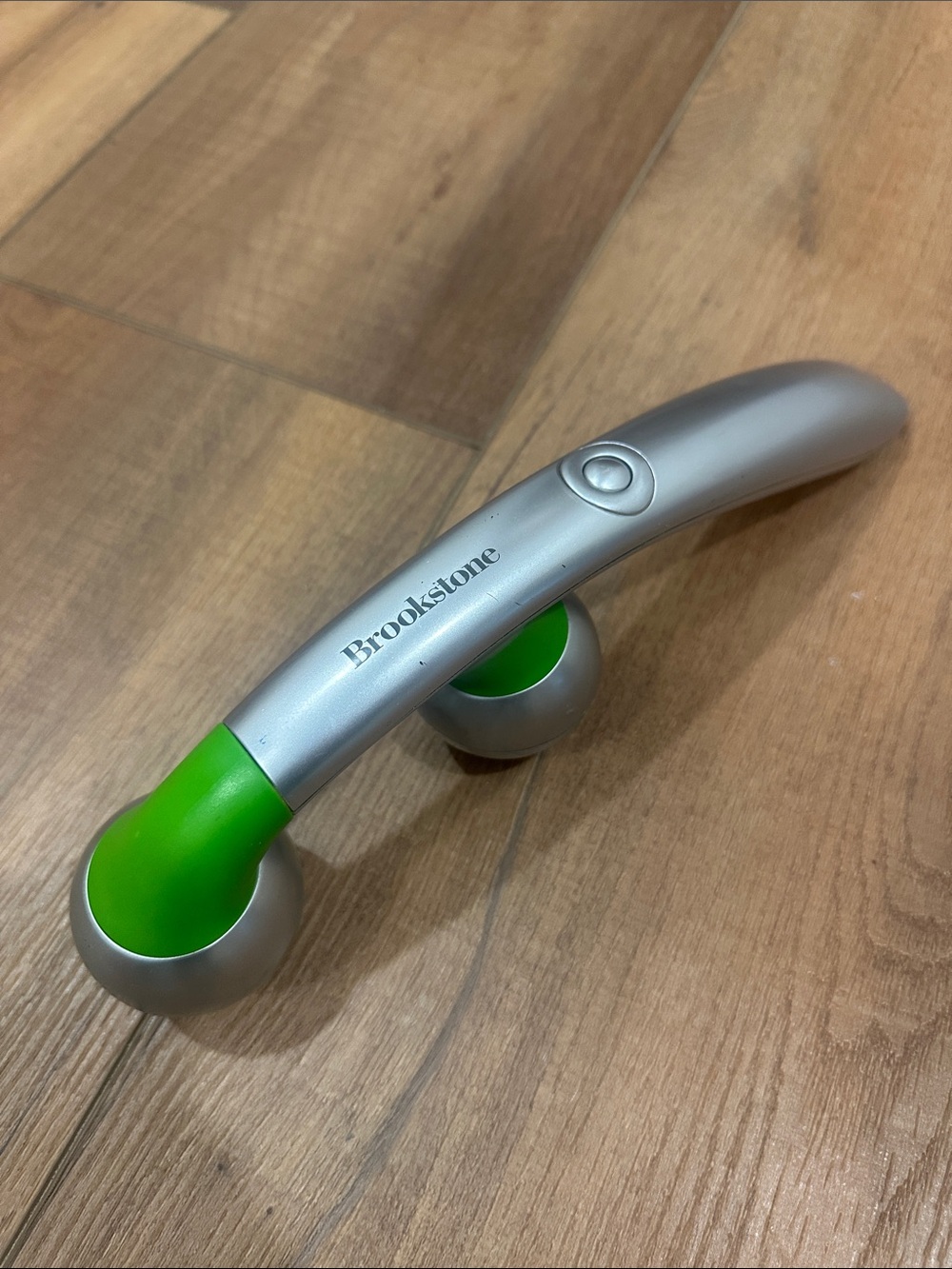 Brookstone Silver Handheld Roller Massager with Green Cups